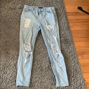 Distressed ankle jeans